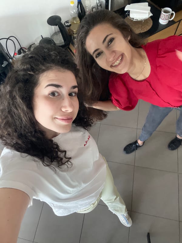 Women pose for photos in Sofia office early morning