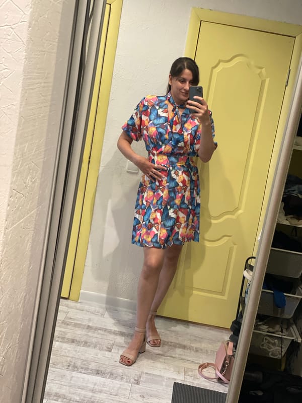 Mirror selfie in butterfly-print dress, Izhevsk