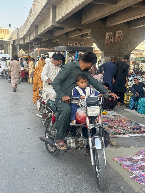 Man with child spotted on motorcycle in Quetta