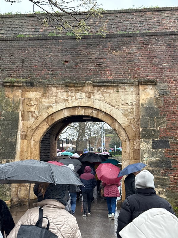 Tourists visit Belgrade Fortress during rainy morning