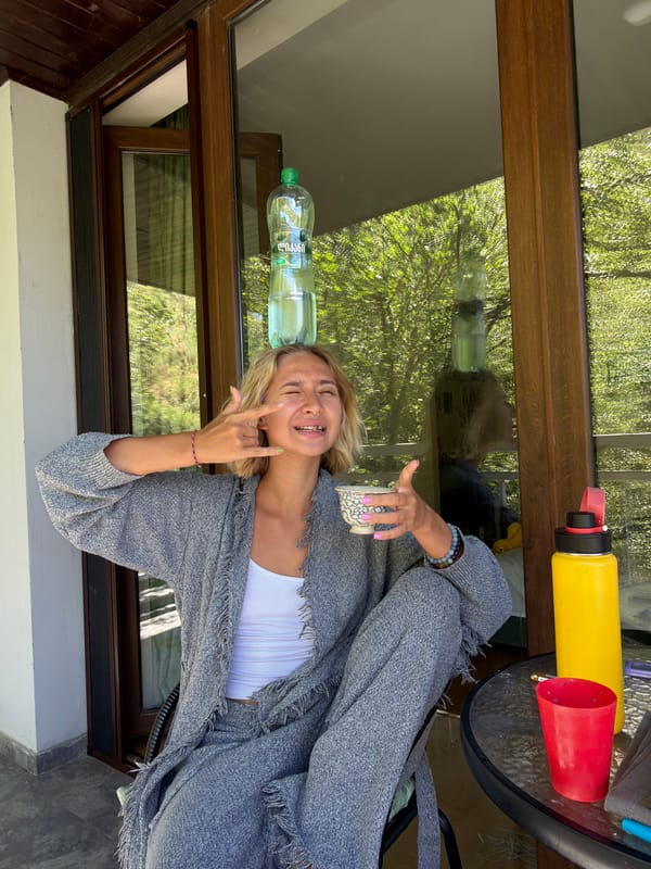 Tea time on a Tbilisi balcony, with a balancing act