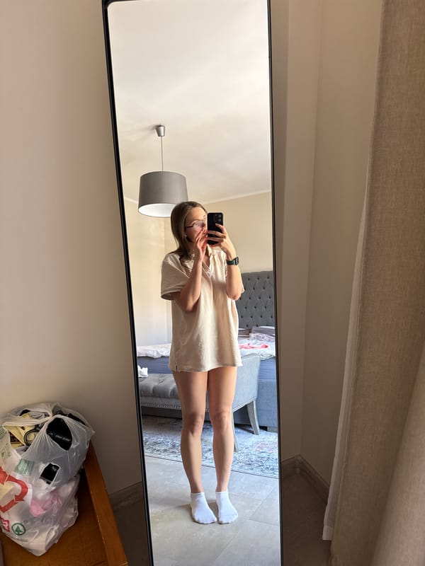 Woman Takes Mirror Selfie in Karlovy Vary