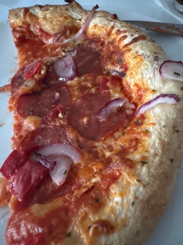 Evening indoor moments: pizza dinner and pellet stove warmth