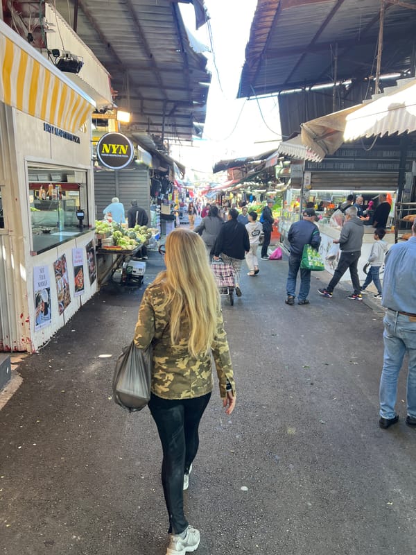 Morning activity captured at busy Tel Aviv street market
