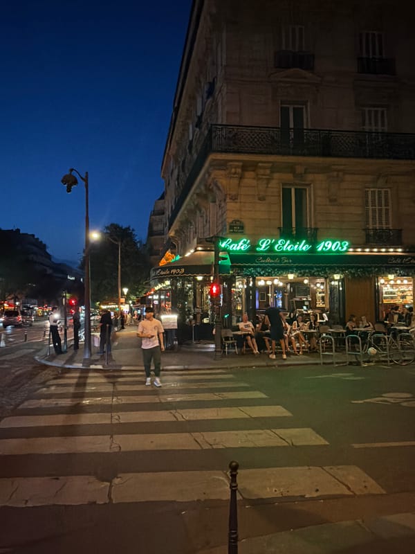 Arc de Triomphe at dusk, Paris streets at night