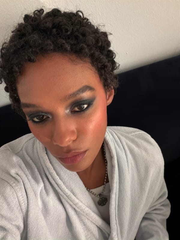 Person in blue hoodie observed indoors in Bagnolet