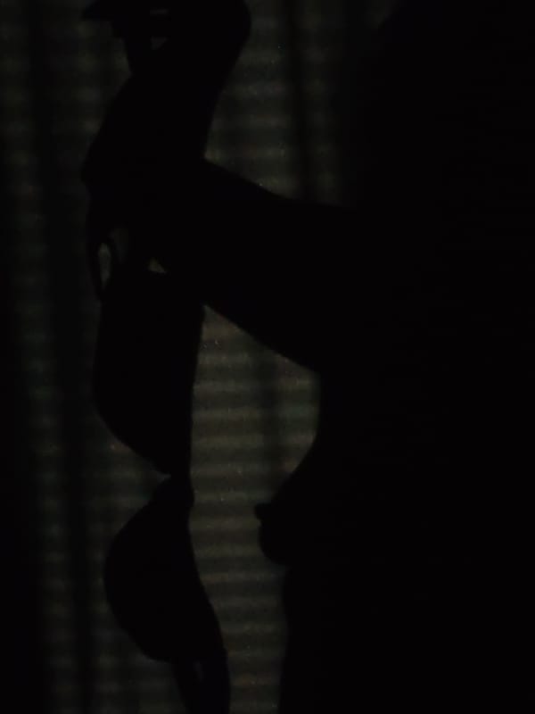 Silhouetted figures photographed in Markovskii, Russia