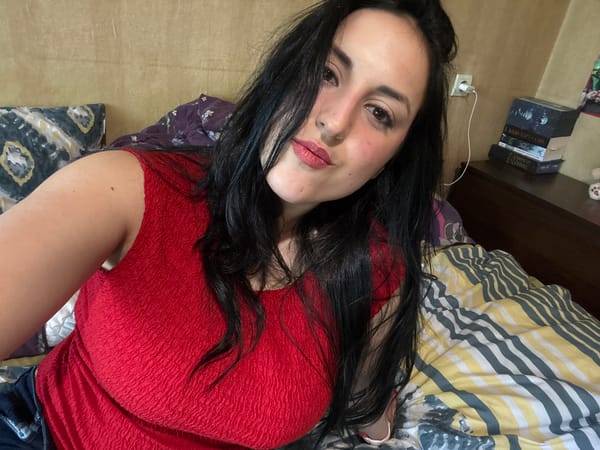 Woman photographs herself indoors in Varna, Bulgaria