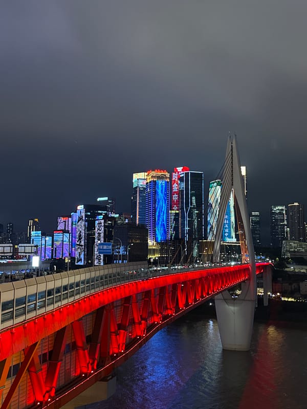 Chongqing's Yuzhong waterfront buzzing on a summer night