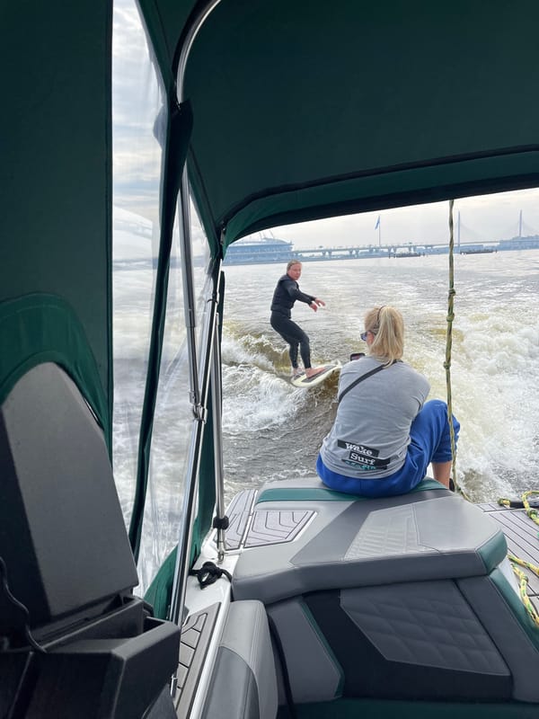 Wake surfing and skyline views on St. Petersburg's waterways