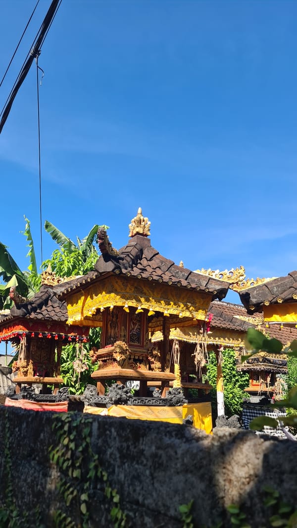 Street scenes and Balinese shrines across a Denpasar neighborhood