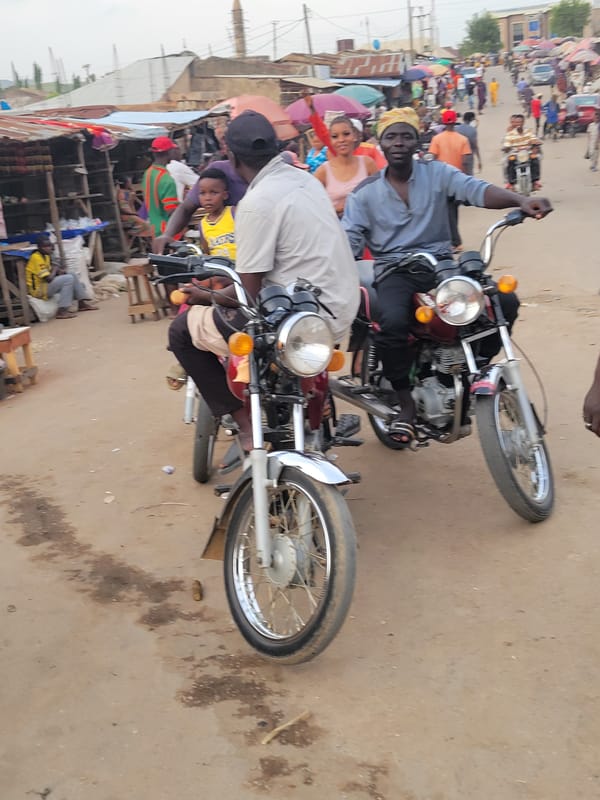 Afternoon street life unfolds in Nigerian market towns