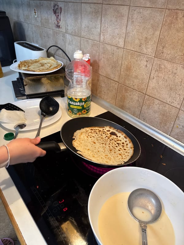 Woman Makes Pancakes in Sofia Kitchen Saturday Morning