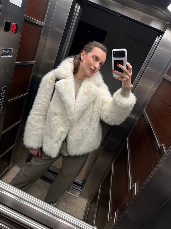 Woman takes elevator selfie in Budva, Montenegro