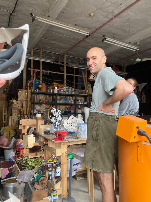 Man photographed smiling in Moscow workshop