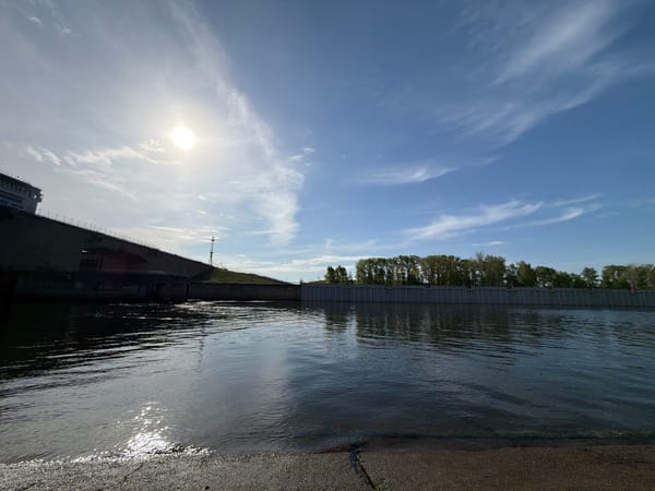 Woman with balloons spotted near Kama River at dawn