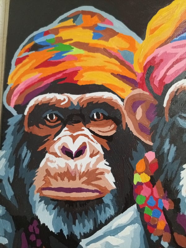 Ornate primate paintings and perfume bottle documented at location