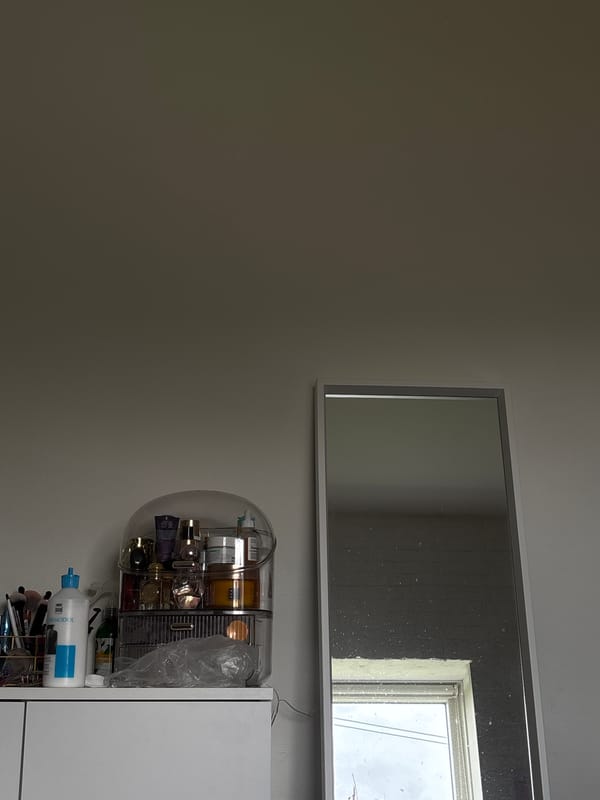 Personal moments captured in Enschede bedroom during afternoon