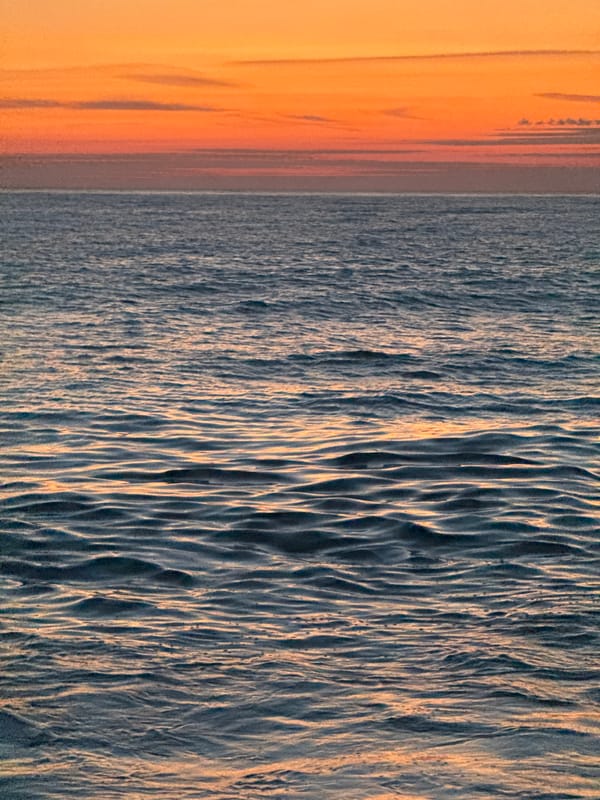 Sunset captured over Batumi coast, Georgia beach bathed orange