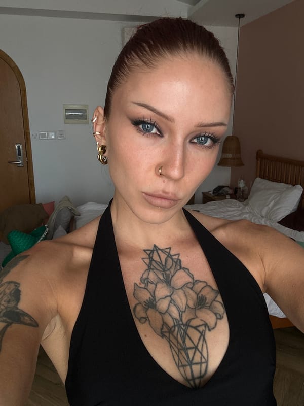 Hotel room selfie session in Da Nang, tattoos and vapor on display