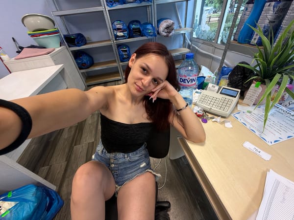 Selfie session at a Sofia laundromat, mid-afternoon.