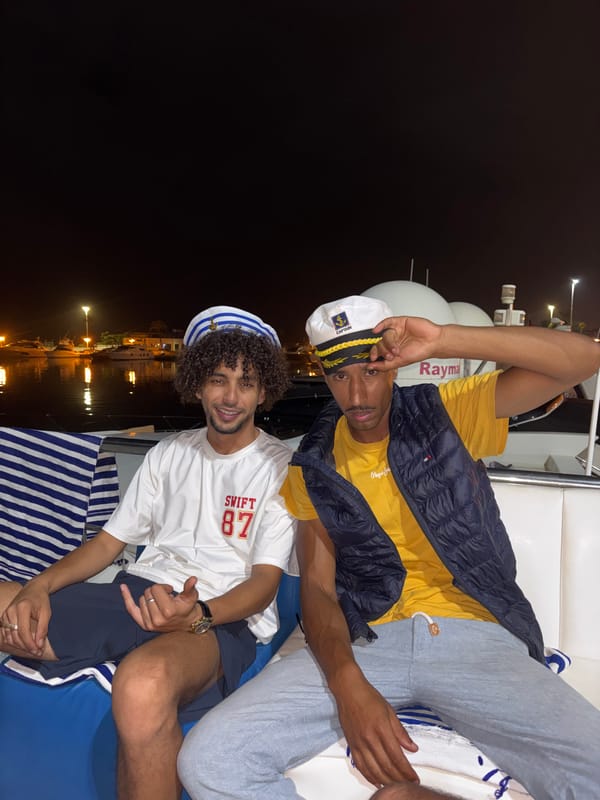 Night gathering on a boat deck in M'Diq, Morocco
