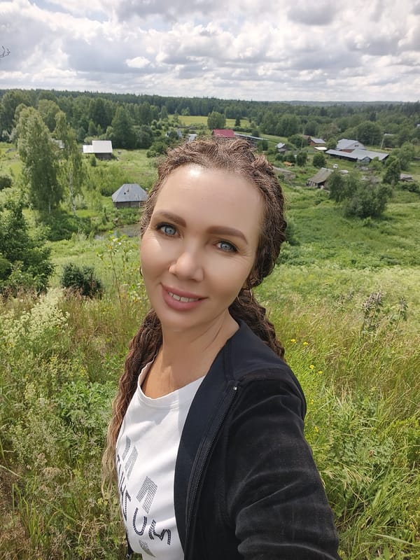 Selfies and rural scenery along a lakeside path in Russia