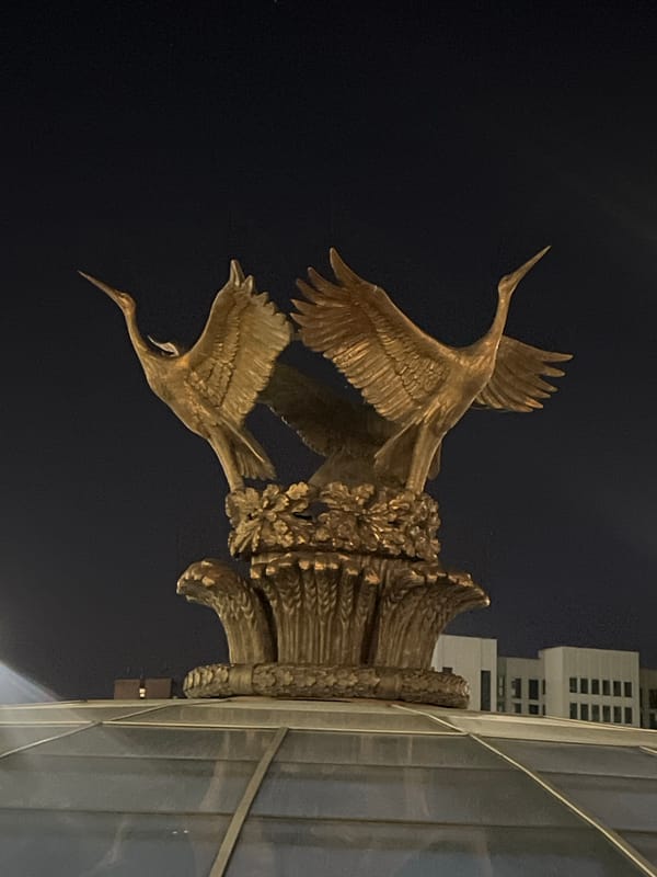 Urban scenes with sculpture and dog captured in Minsk