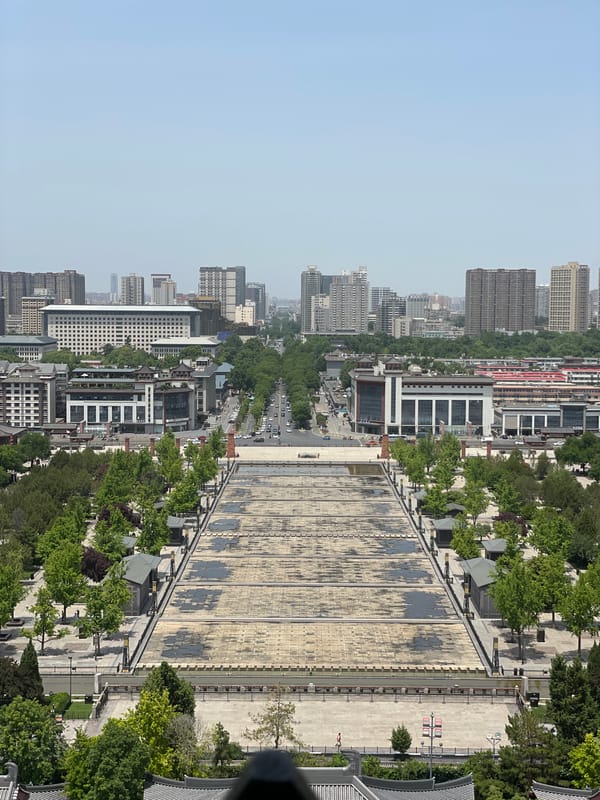 Tourist documents historic and modern Yanta District landmarks