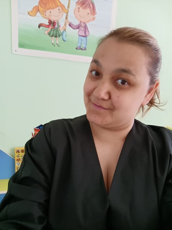 Woman documents morning work routine at Russian daycare facility