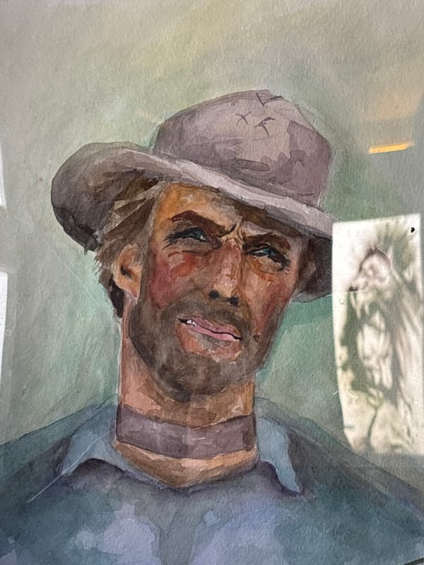 Watercolor portrait of hatted man in blue shirt documented