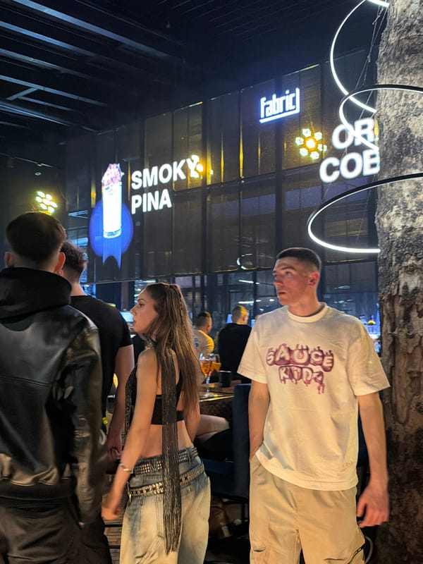 Social gathering captured at dimly lit venue in Burgas