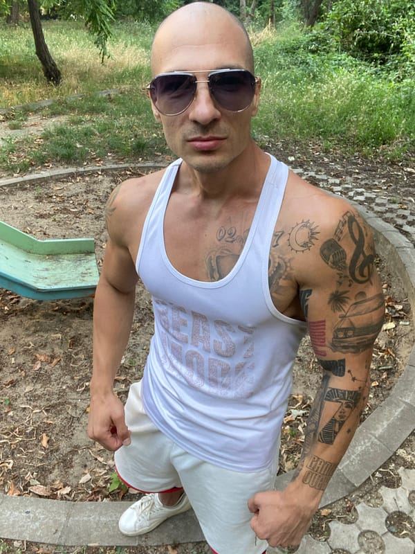 Afternoon hangout at a Pleven playground, tattoos and a dog