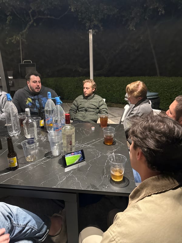 Men gather for nighttime drinks in Mexico City