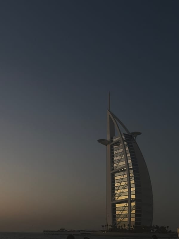 Dubai beachfront sunset captured with Burj Al Arab backdrop