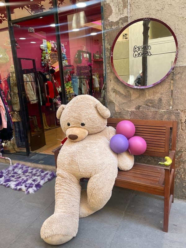 Teddy bear with balloons spotted on Barcelona bench