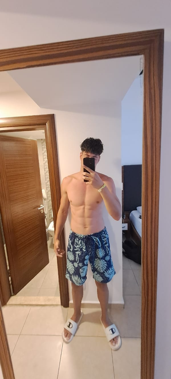 Young man takes multiple mirror selfies in Kuşadası facility