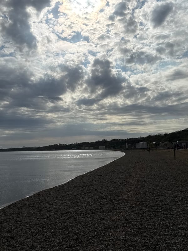 Woman documents coastal visit in Taman, Russia