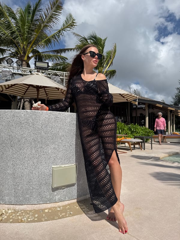 Woman poses at outdoor venue in Choeng Thale, Thailand