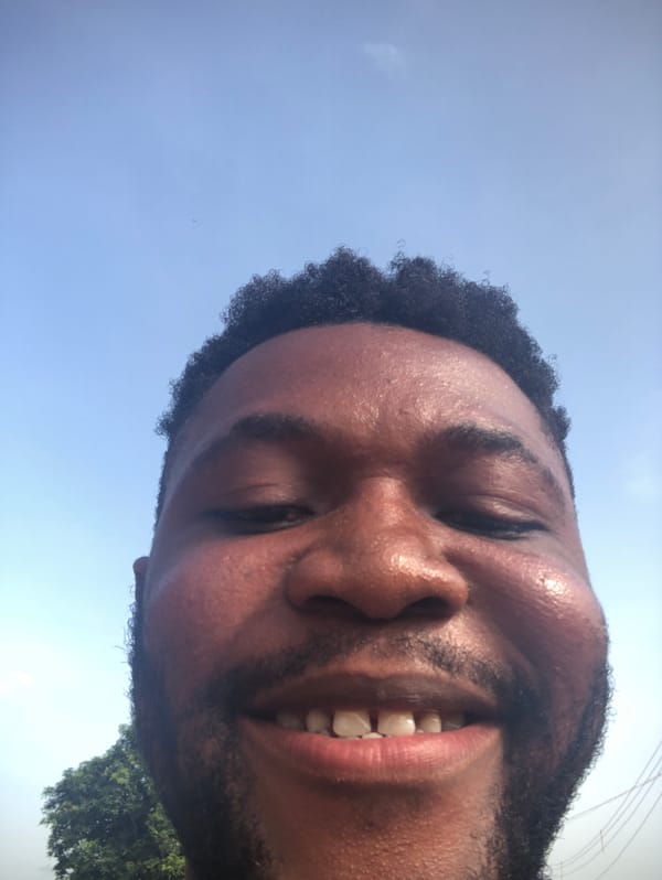 Man photographed smiling in multiple shots at unknown location