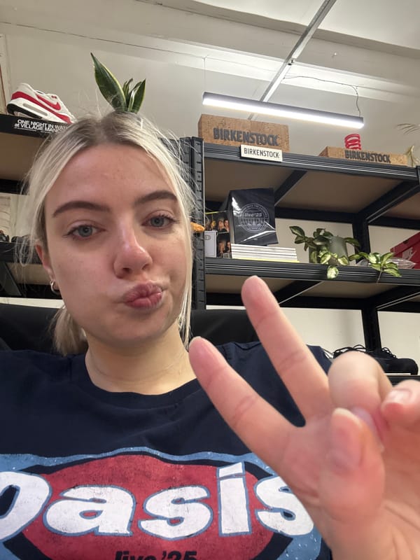 Woman takes selfie amid personal items in Manchester