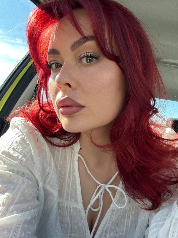 Portrait of red-haired woman photographed in Узюково, Russia
