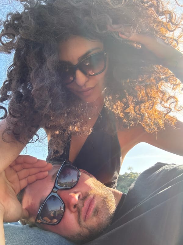 Two people pose for outdoor selfie in Los Angeles