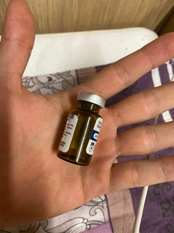 Man photographed with amber vial in Koskolovo, Russia