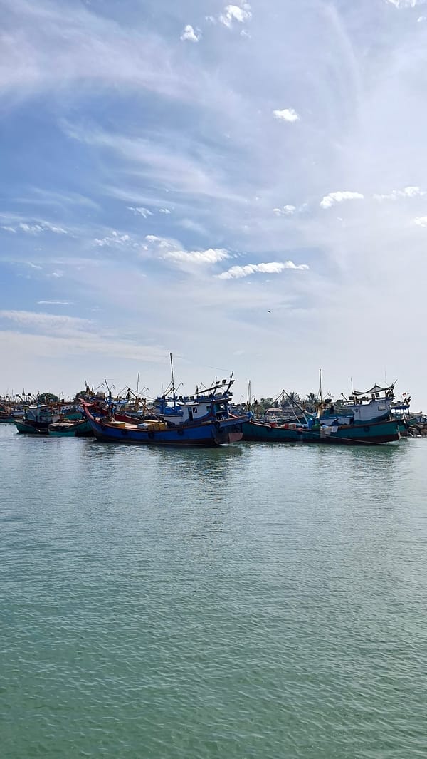Fishing harbor and street life in Lhokseumawe, Indonesia