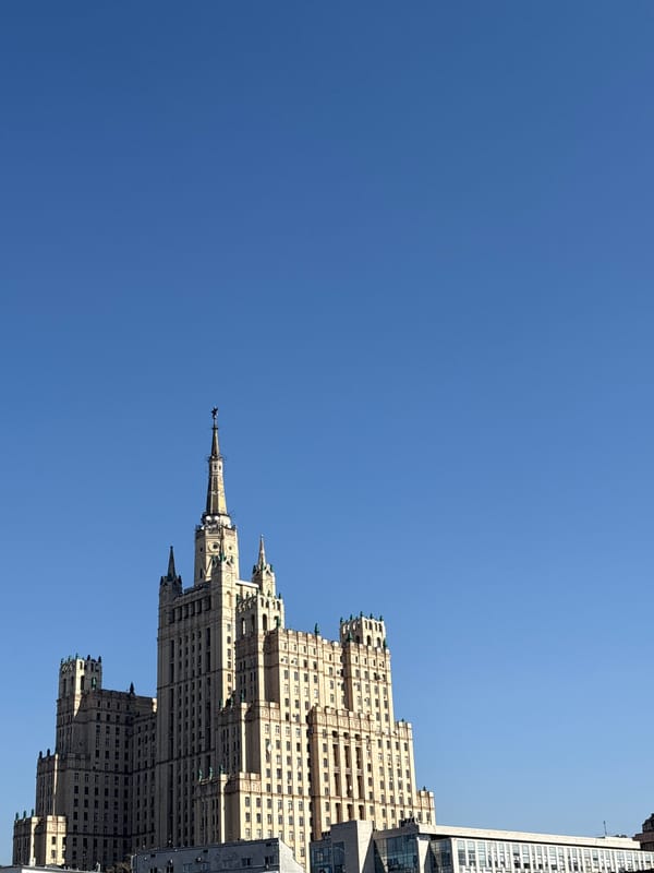 Stalinist skyscraper photographed against clear Moscow sky