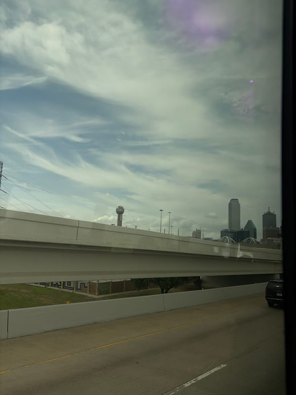 Dallas skyline viewed from highway overpass Friday evening