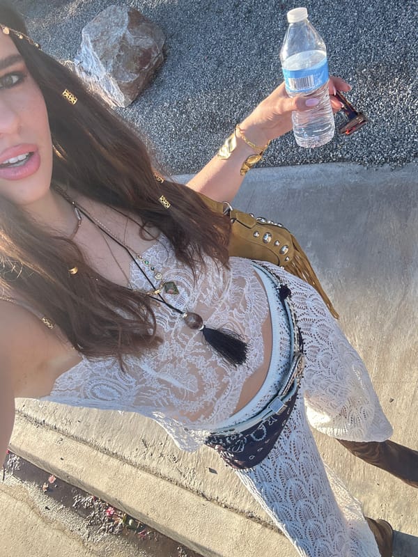 Woman in white outfit spotted outdoors in Indio