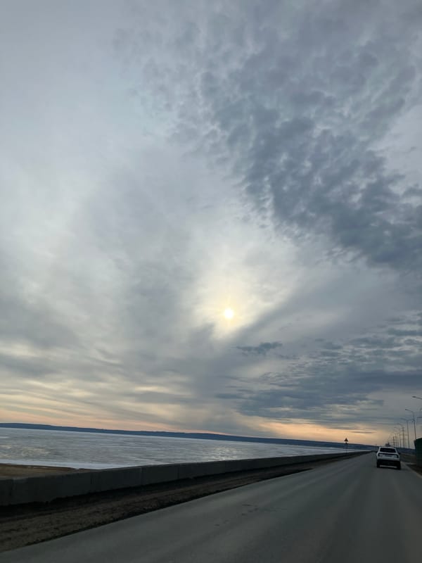 Morning traffic recorded on waterside road in Noviy, Russia