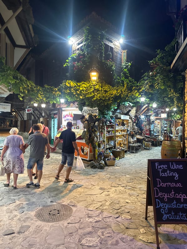 Nesebar old town at night, cobblestones and wine shops